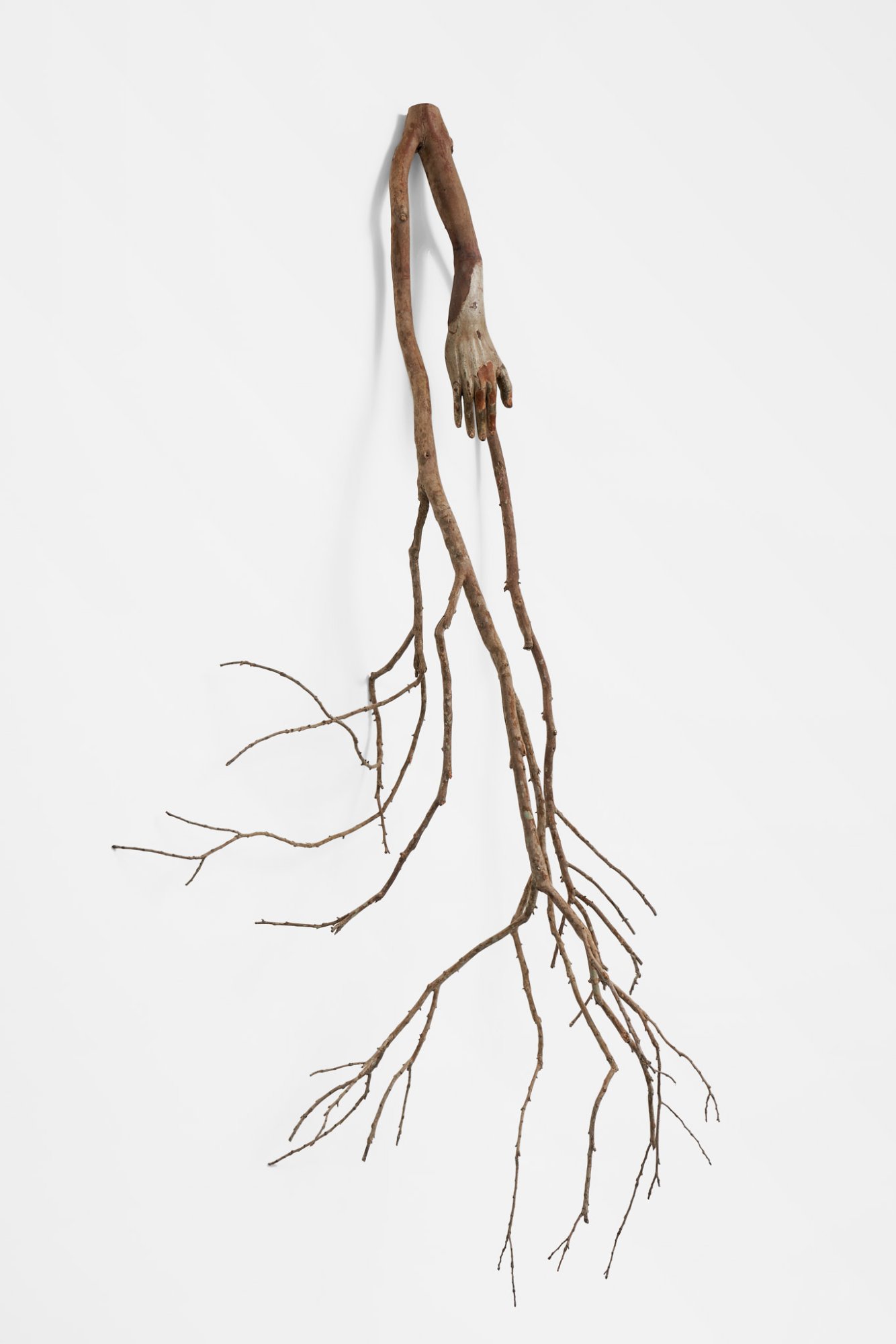 André Romão, Hand (Mercé), 2021. Wooden sculptural fragment (Portugal 1700’s), camelia. 140 x 60 x 50 cm (approx). Unique. Photo: GRAYSC.
