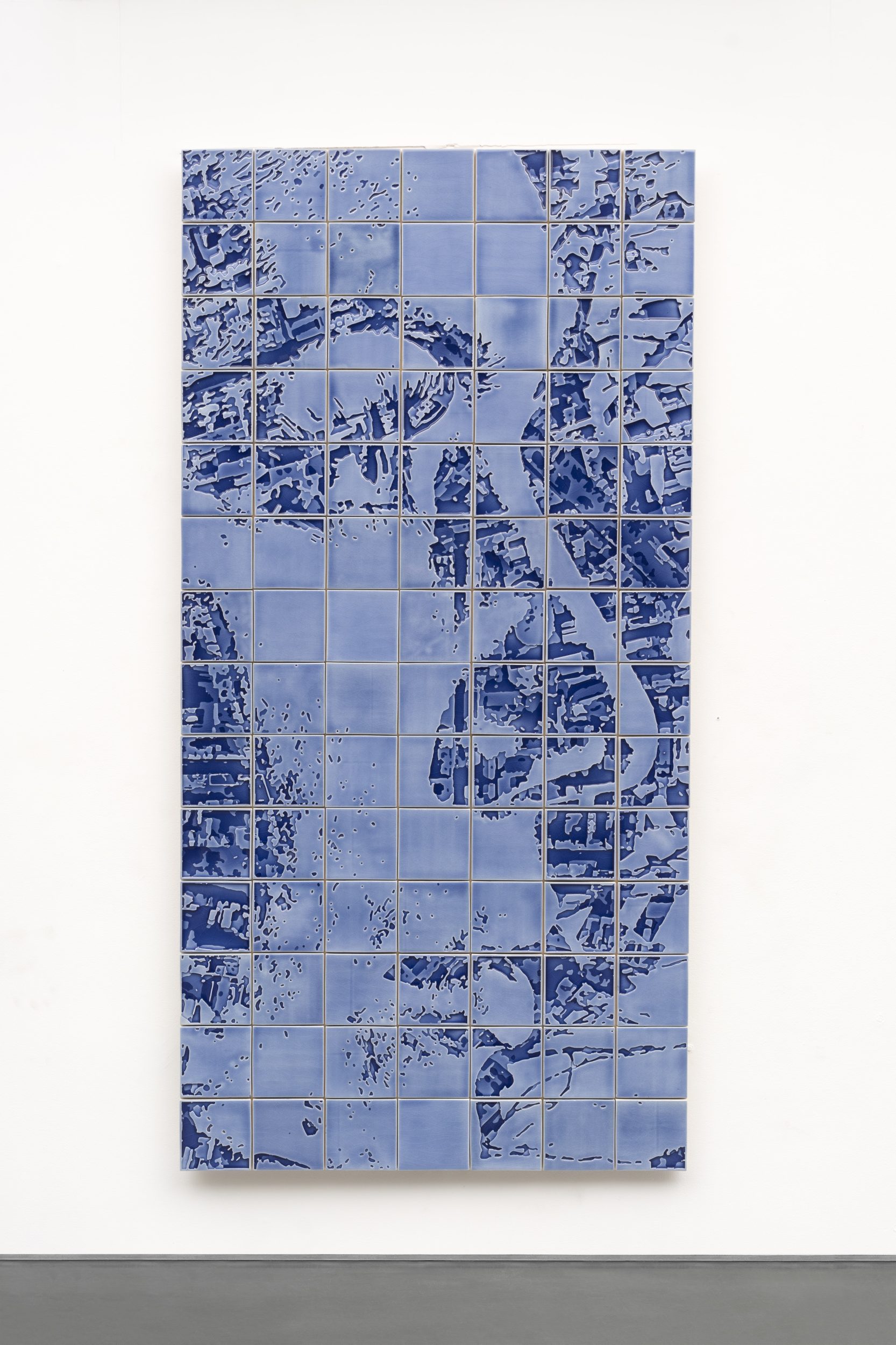 Alexandre Farto aka Vhils, Luminous Series #01, 2024. Embossed glazed ceramic tiles. 200 x 100 x 8 cm. Unique

