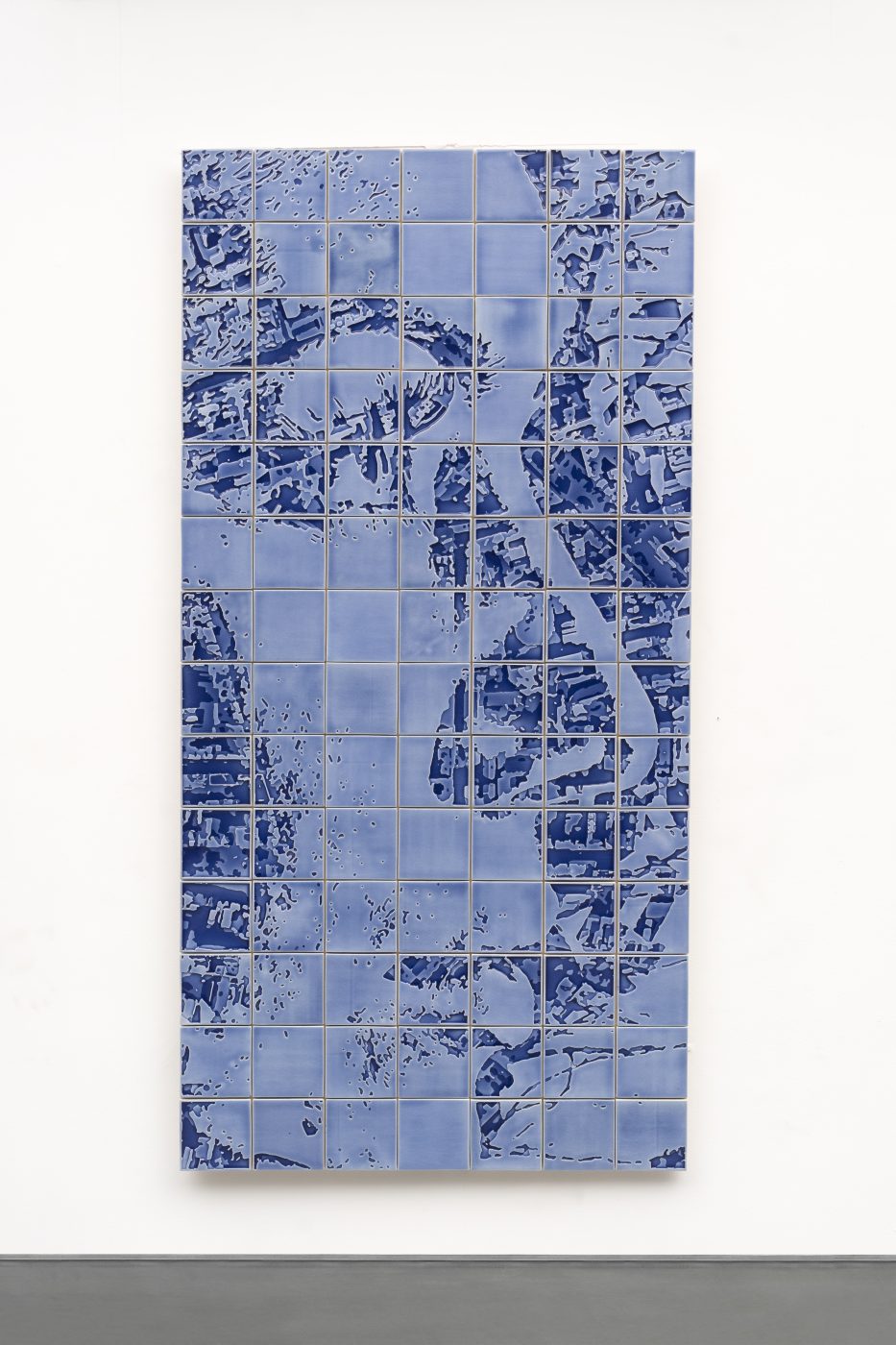 Alexandre Farto aka Vhils, Luminous Series #01, 2024. Embossed glazed ceramic tiles. 200 x 100 x 8 cm. Unique
