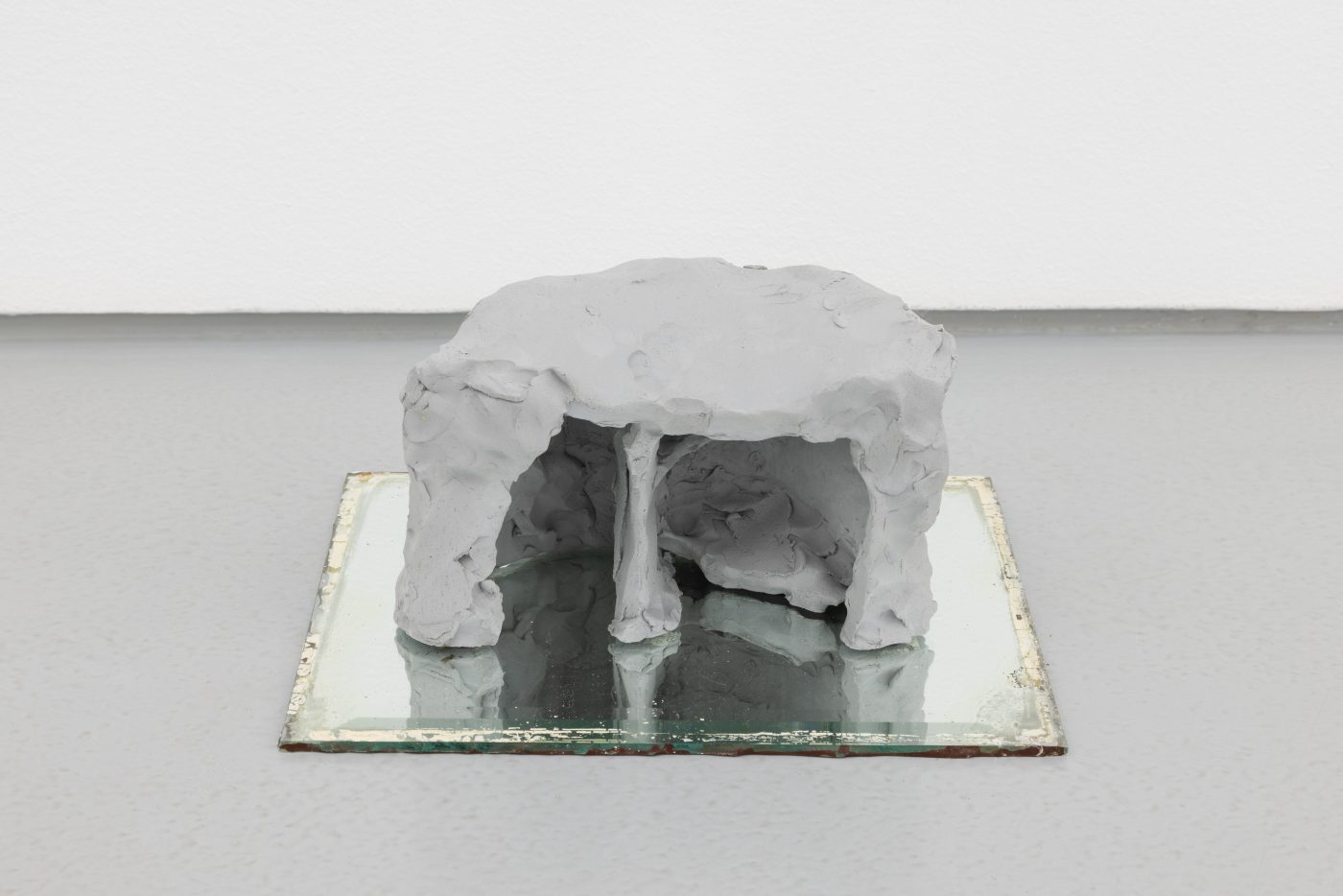 Susanne S. D. Themlitz, Shelter (Rorschach), 2025. Ceramic, mirror with ink. 33 x 27 x 14 cm.
