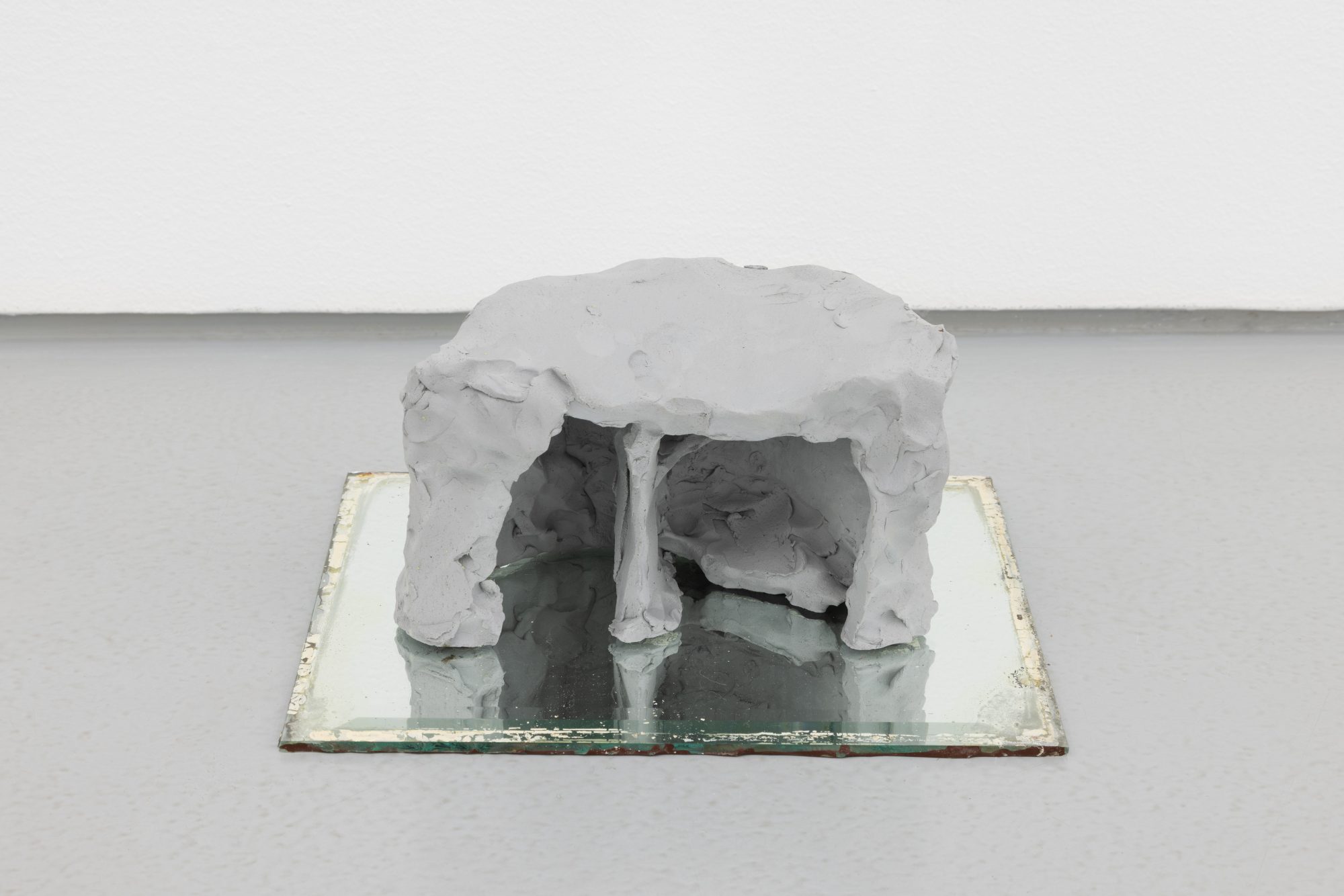 Susanne S. D. Themlitz, Shelter (Rorschach), 2025. Ceramic, mirror with ink. 33 x 27 x 14 cm.