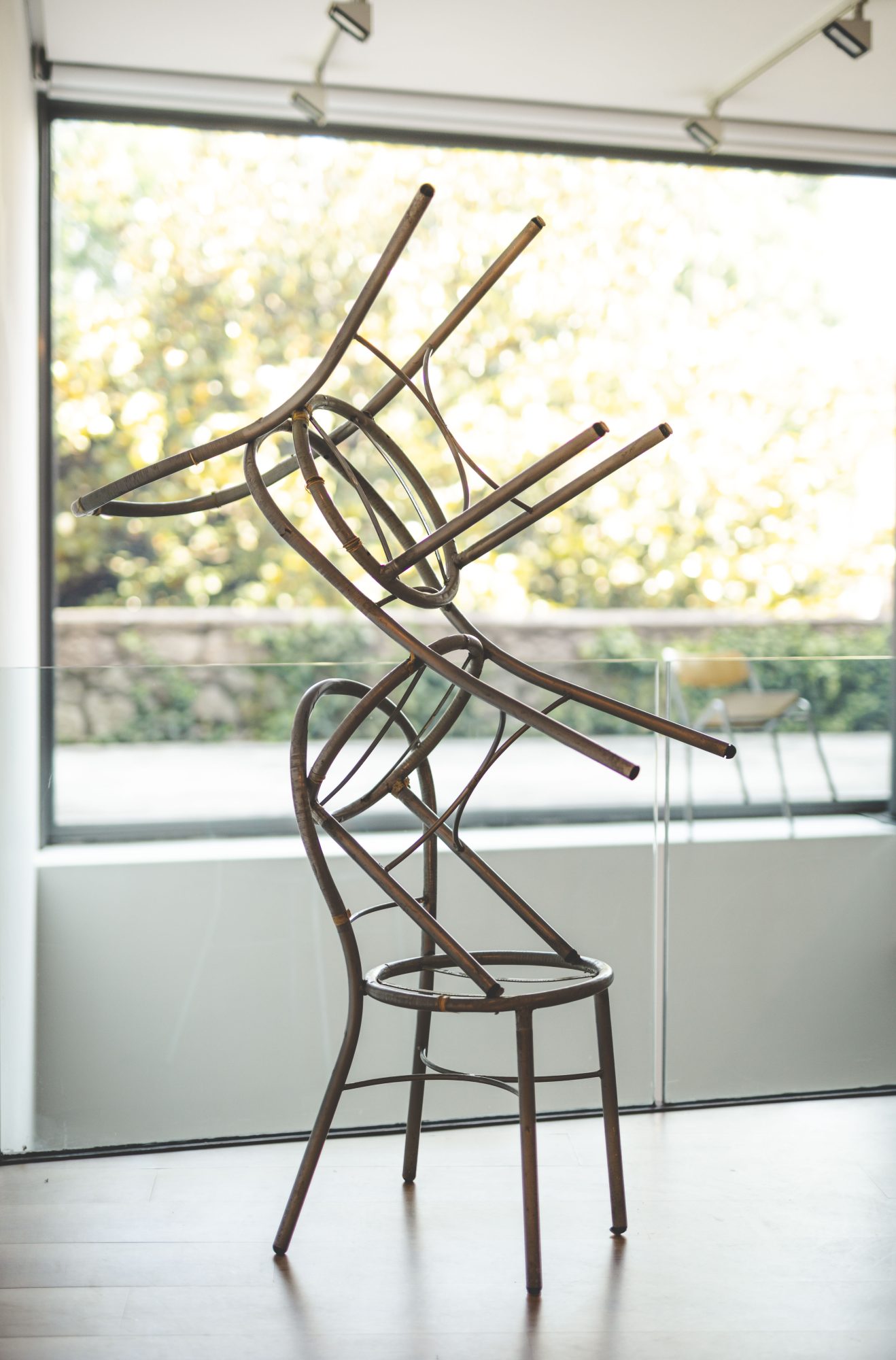 Carlos Bunga, Saltimbanqui #2, 2025. Chairs. 168 x 45 x 120 cm.
