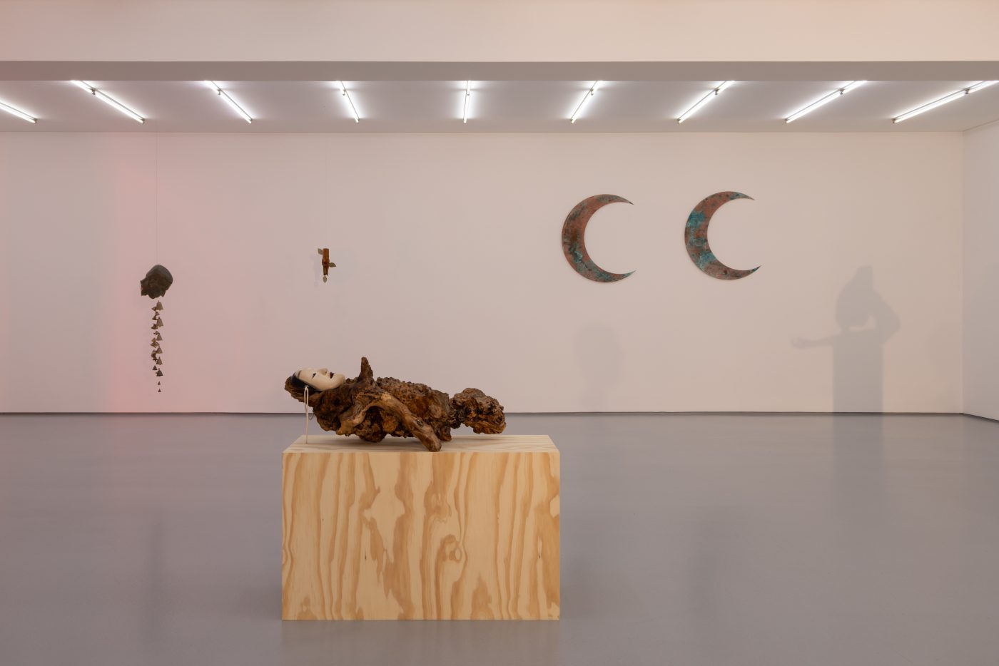André Romão, Via Lactea, 2026. Sculptural fragment (patinated terracotta, Italy ,1930’s), bells. 93 x 17 x 20 cm
