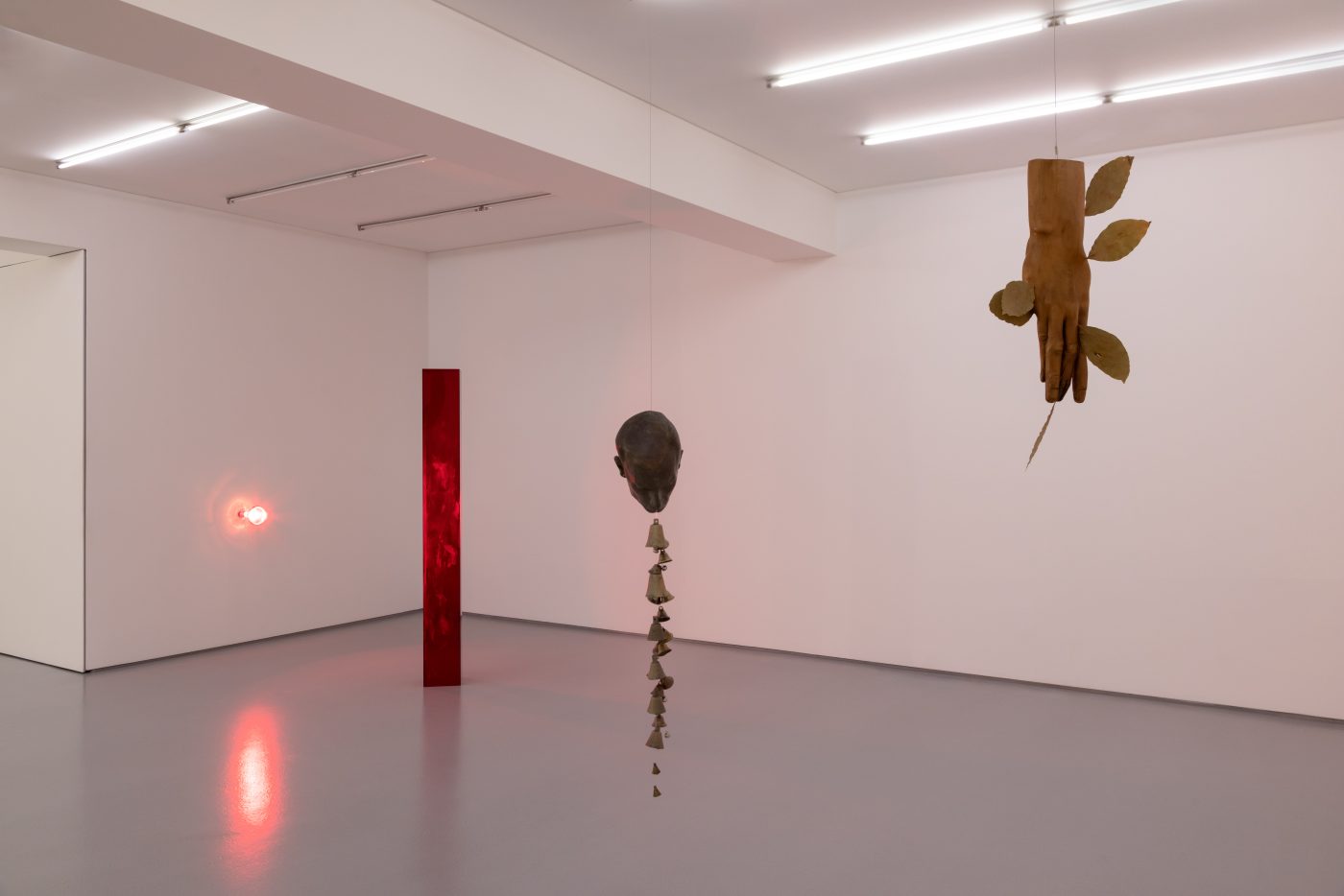 André Romão, Via Lactea, 2026. Sculptural fragment (patinated terracotta, Italy ,1930’s), bells. 93 x 17 x 20 cm
