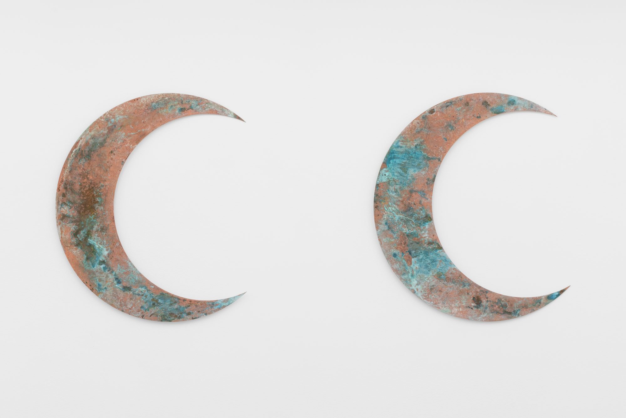 André Romão, Doppelmond, 2026. Brass, oxidizing agents, varnish. 2x (90 x 90 cm)
