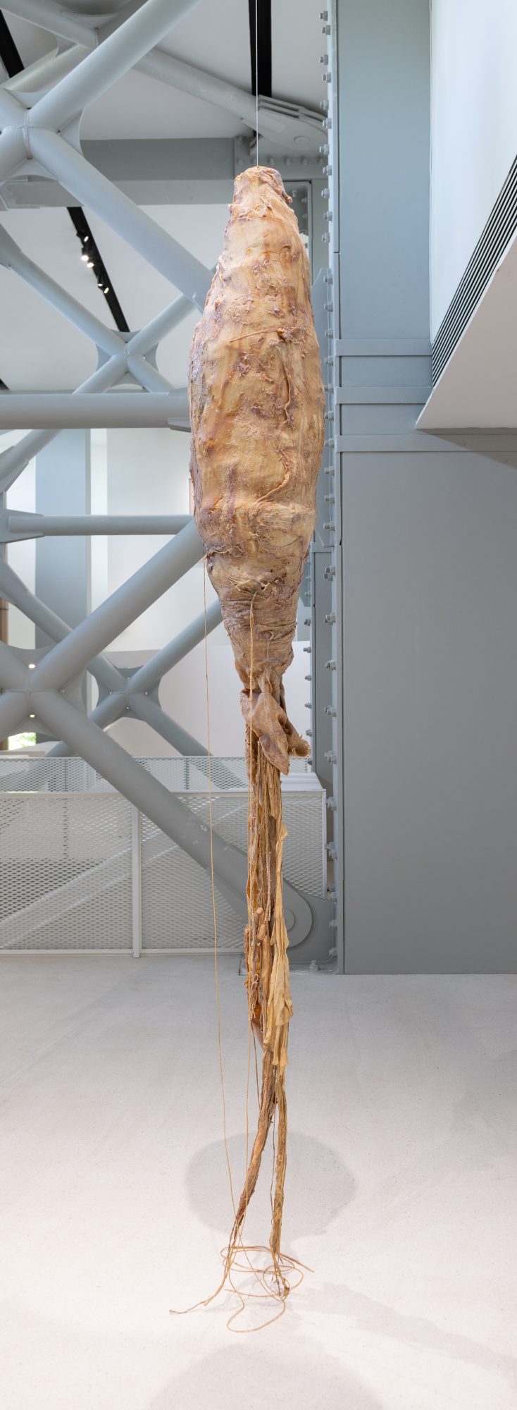 Carlos Bunga, Cocoon #7. Latex paint and glue on papier-mâché and wood. 140 x ø 0 cm
