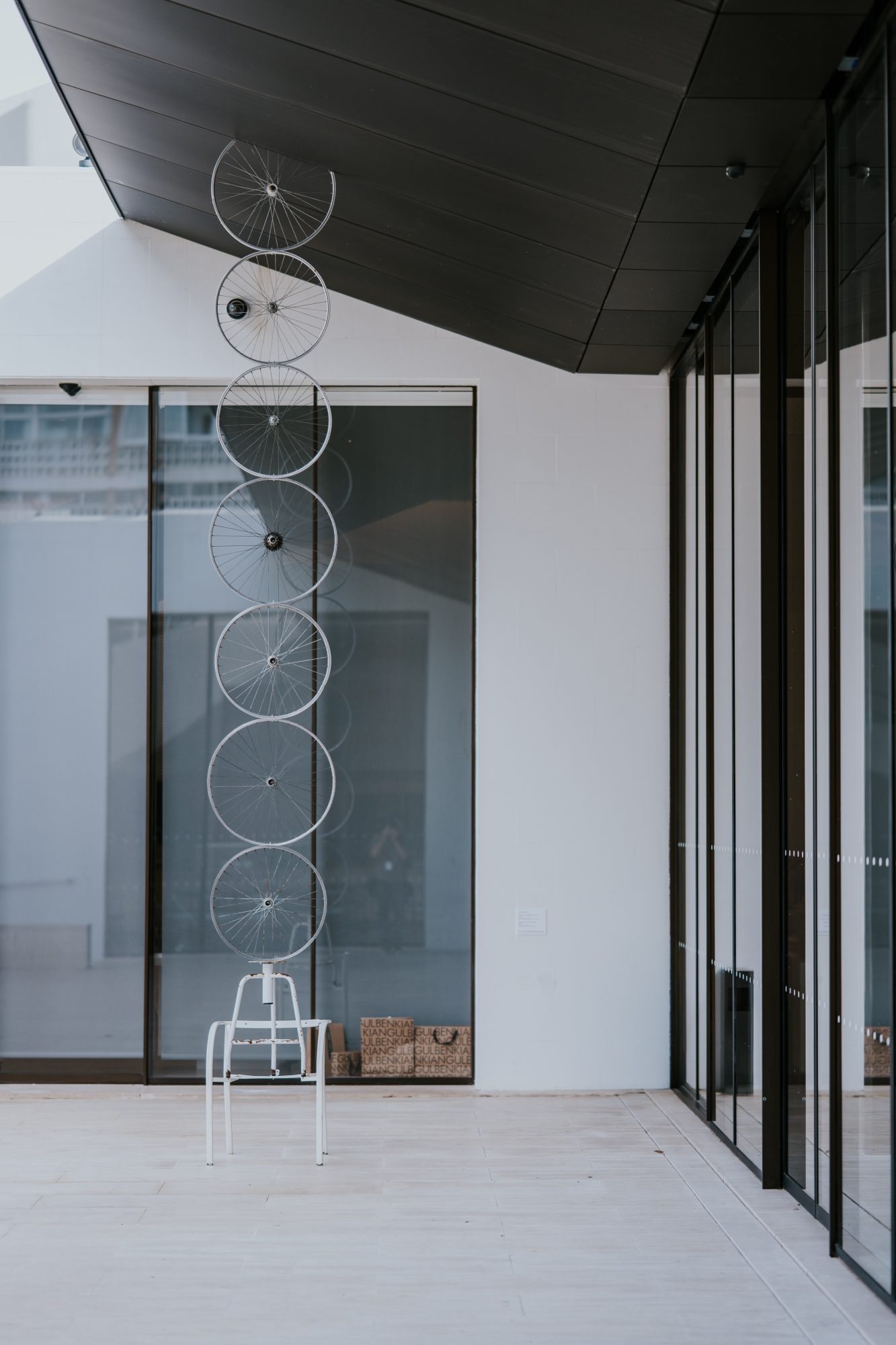 Carlos Bunga, Saltimbanqui #5, 2025. Chair, stool base and wheels. Minimum dimensions: 275 x 50 x 57 cm
