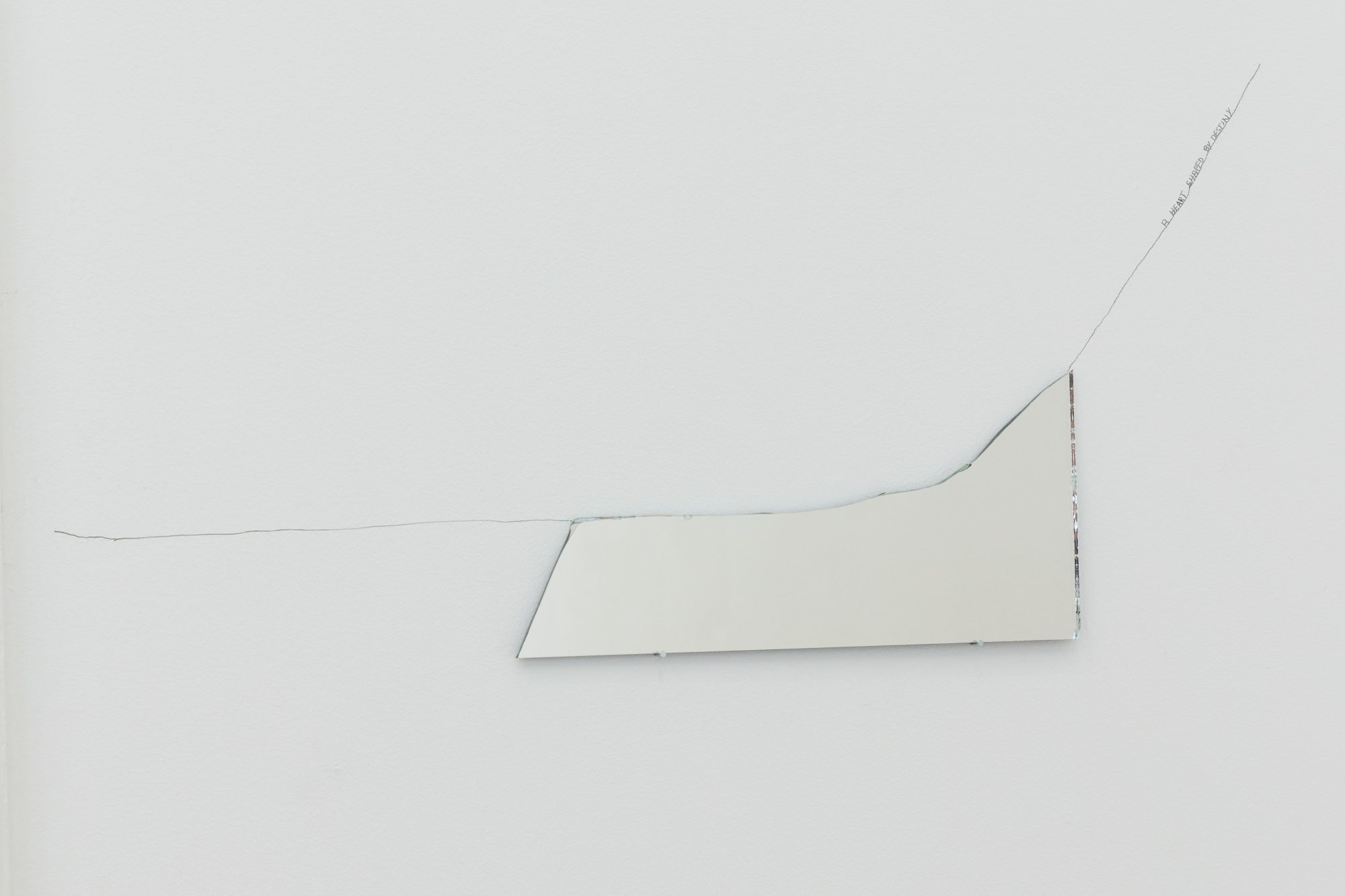 Charbel-joseph H. Boutros, A heart shaped by destiny, 2025-2026. Broken mirror, nails, drawing on wall, destiny. 10 x 30 cm
&nbsp;
