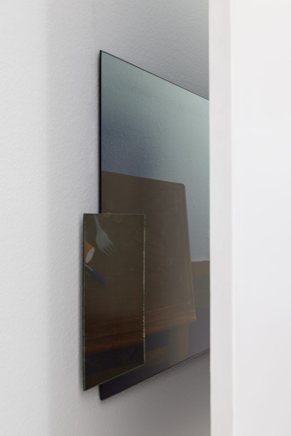 Ana Vieira, Close Up (11), 2004. White panel, photograph, mirrors, and metal cables